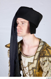  Photos Medieval Prince in cloth dress 1 Formal Medieval Clothing black chaperon caps  hats head medieval Prince 0002.jpg